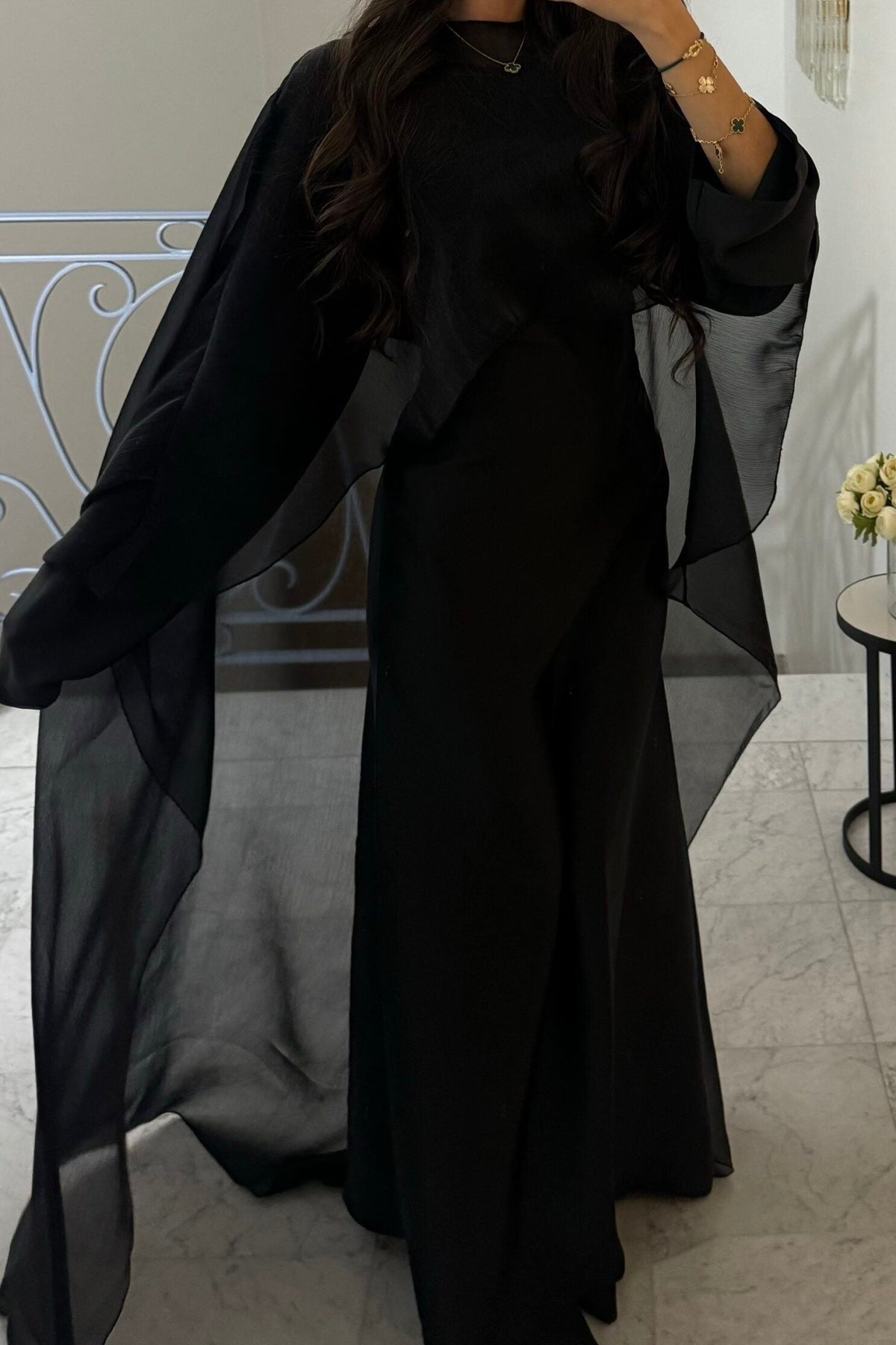 Cape-Kleid Manama